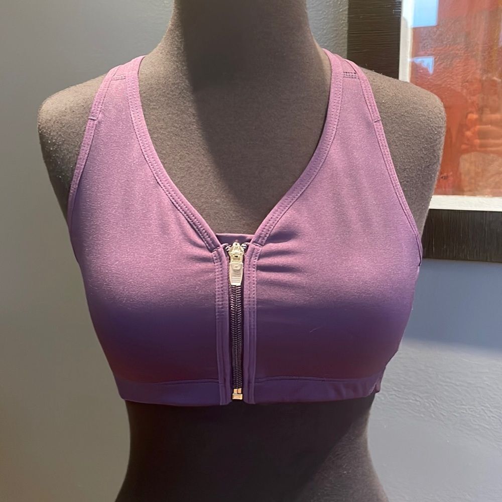 Moving Comfort grape zipper front racerback sports bra. Medium.